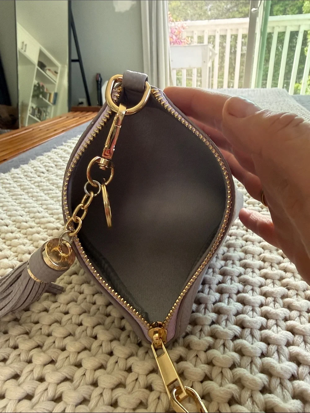 NWOT Lavender Pyramid Tassel Wristlet